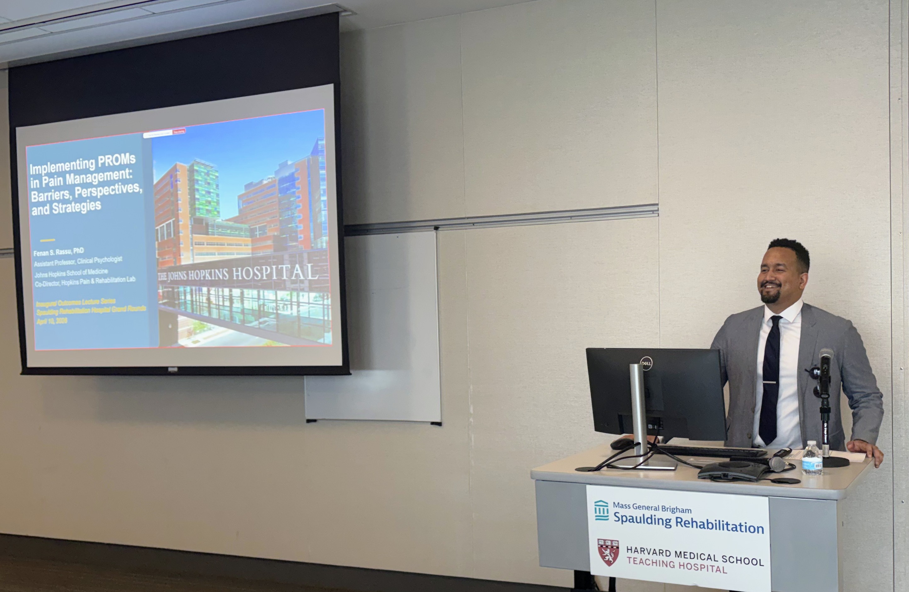 Dr. Fenan Rassu delivering the inaugural Rehabilitation Outcomes Grand Rounds at Spaulding Rehabilitation Hospital